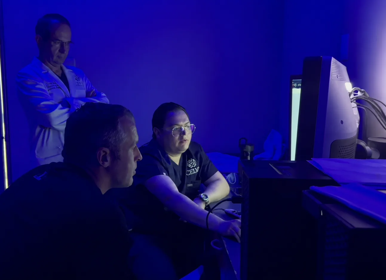 Celva physicians reviewing a patient's imaging together during a case review